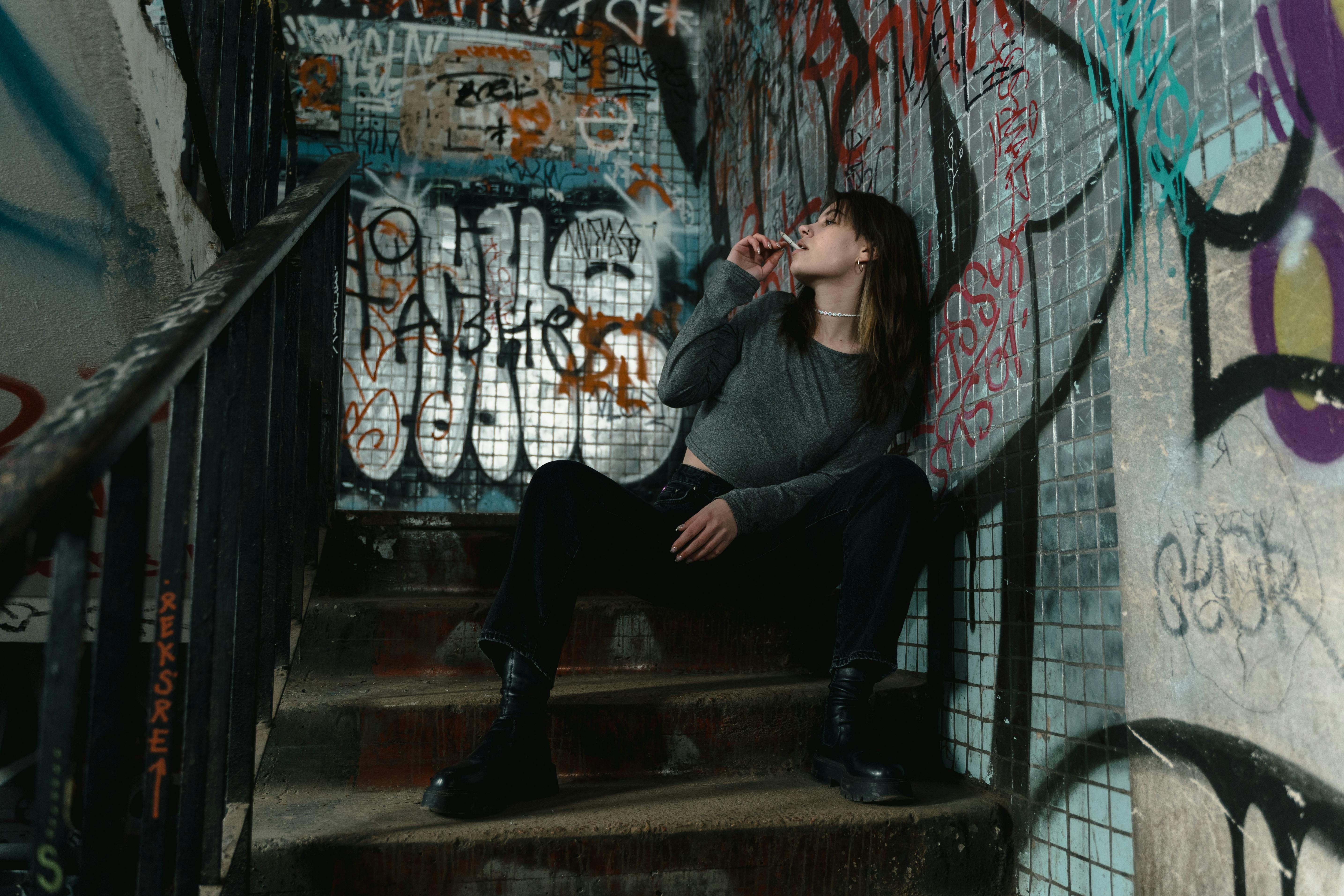 Woman Facing Addiction: Exploring How Intermittent Fasting Can Support Recovery A woman struggling with addiction, reflecting on her recovery journey and the potential benefits of intermittent fasting for mental clarity and reducing cravings.