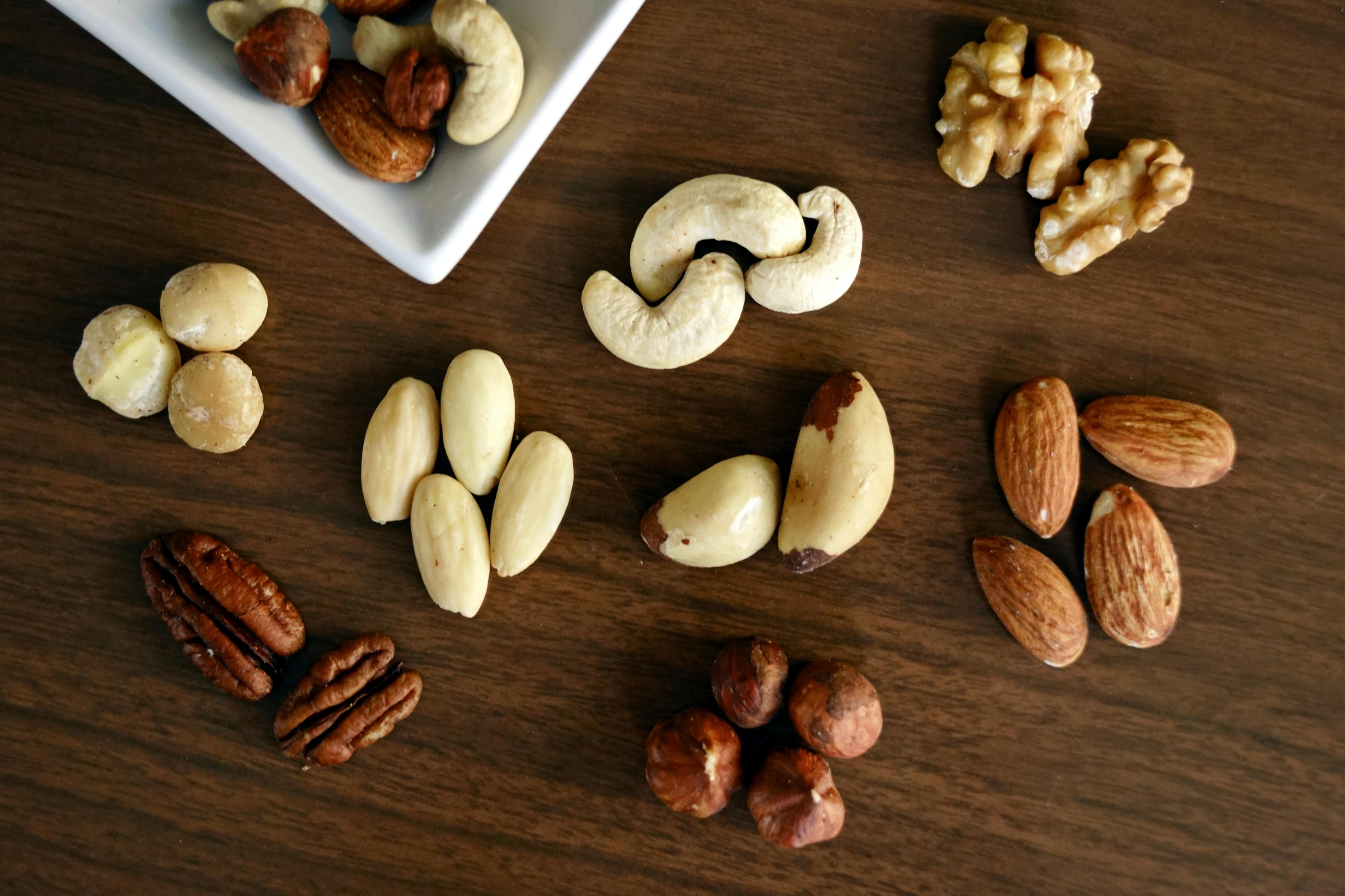 Nuts for Fasting: Including Almonds in Your Intermittent Fasting Routine Assortment of nuts including almonds, suitable for intermittent fasting