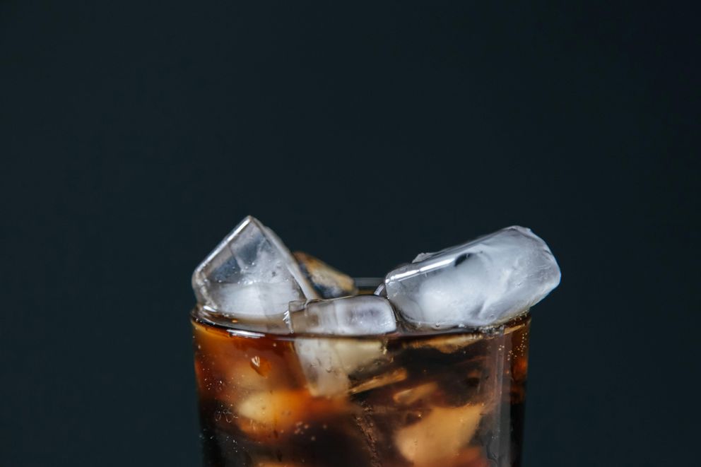 Coke Zero and Intermittent Fasting - Does It Compromise Your Fast? A glass of Coke Zero during fasting hours, symbolizing the debate on fasting and zero-calorie drinks