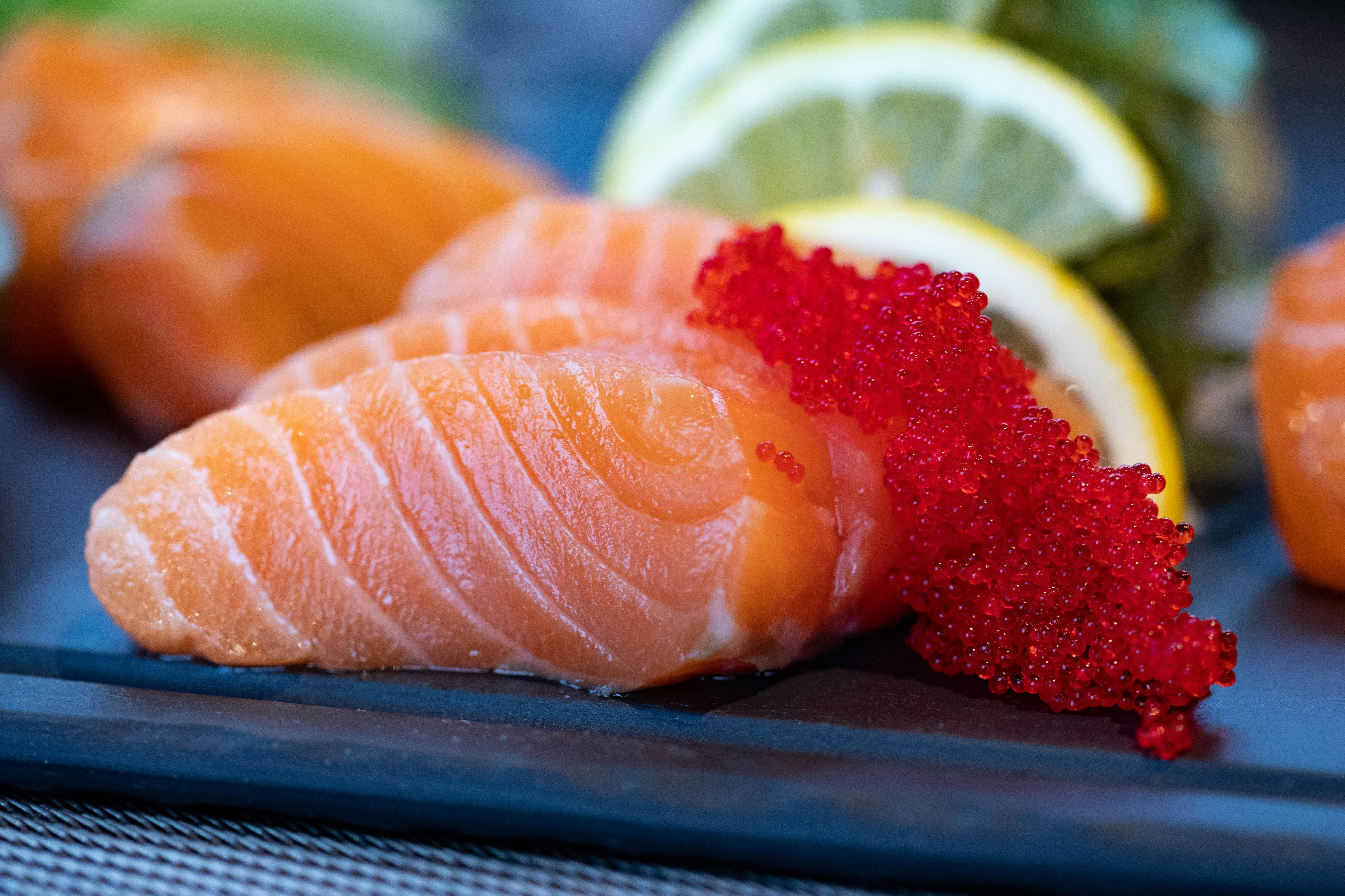 Omega-3 Rich Salmon: A Cornerstone of Anti-Inflammatory Diets for Women A perfectly cooked salmon fillet, rich in omega-3 fatty acids, served with a side of vegetables.