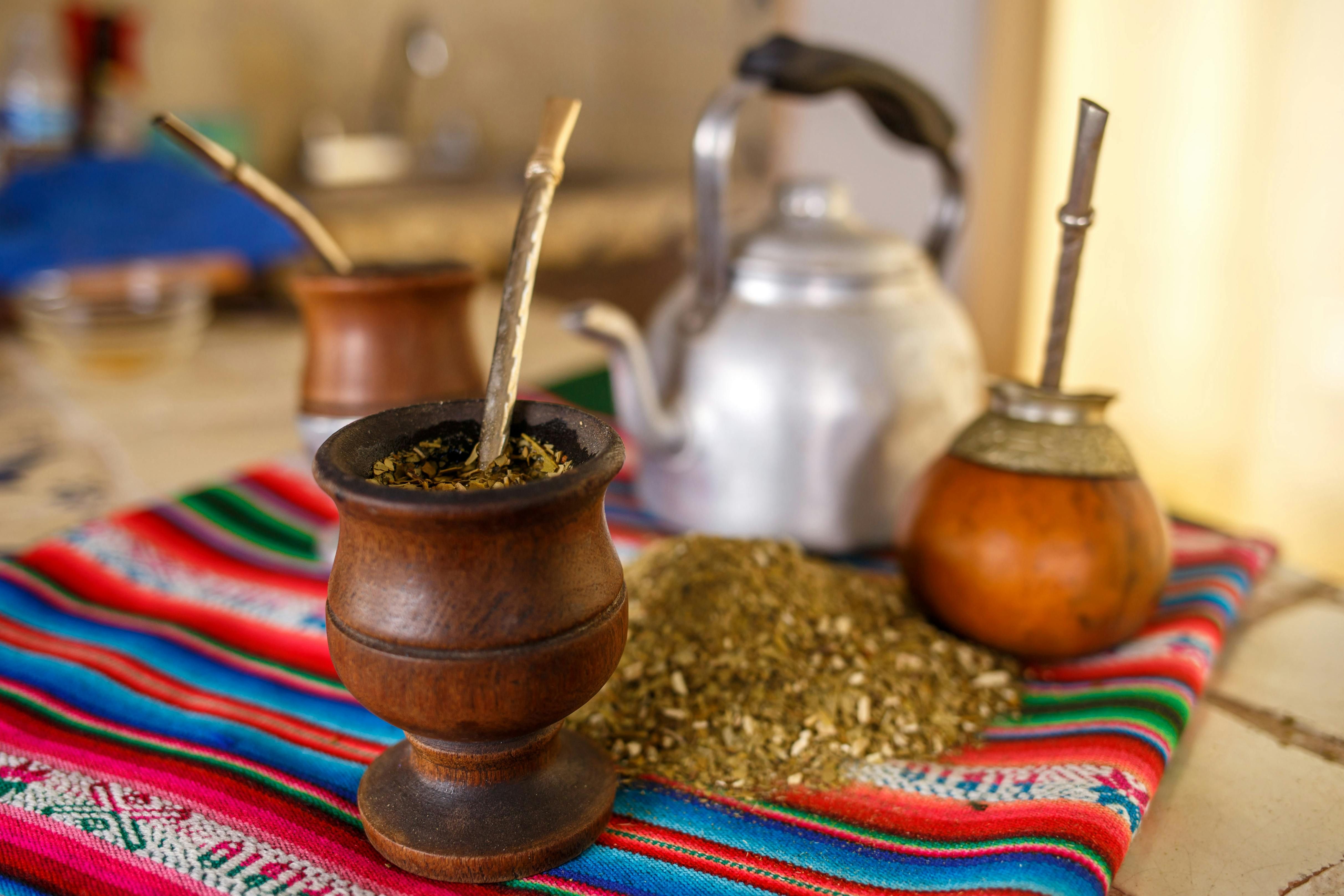 Yerba Mate: An Antioxidant-Packed Traditional Drink for Energy and Wellness A traditional yerba mate drink served in a gourd, offering antioxidant-rich benefits and boosting energy for overall wellness.