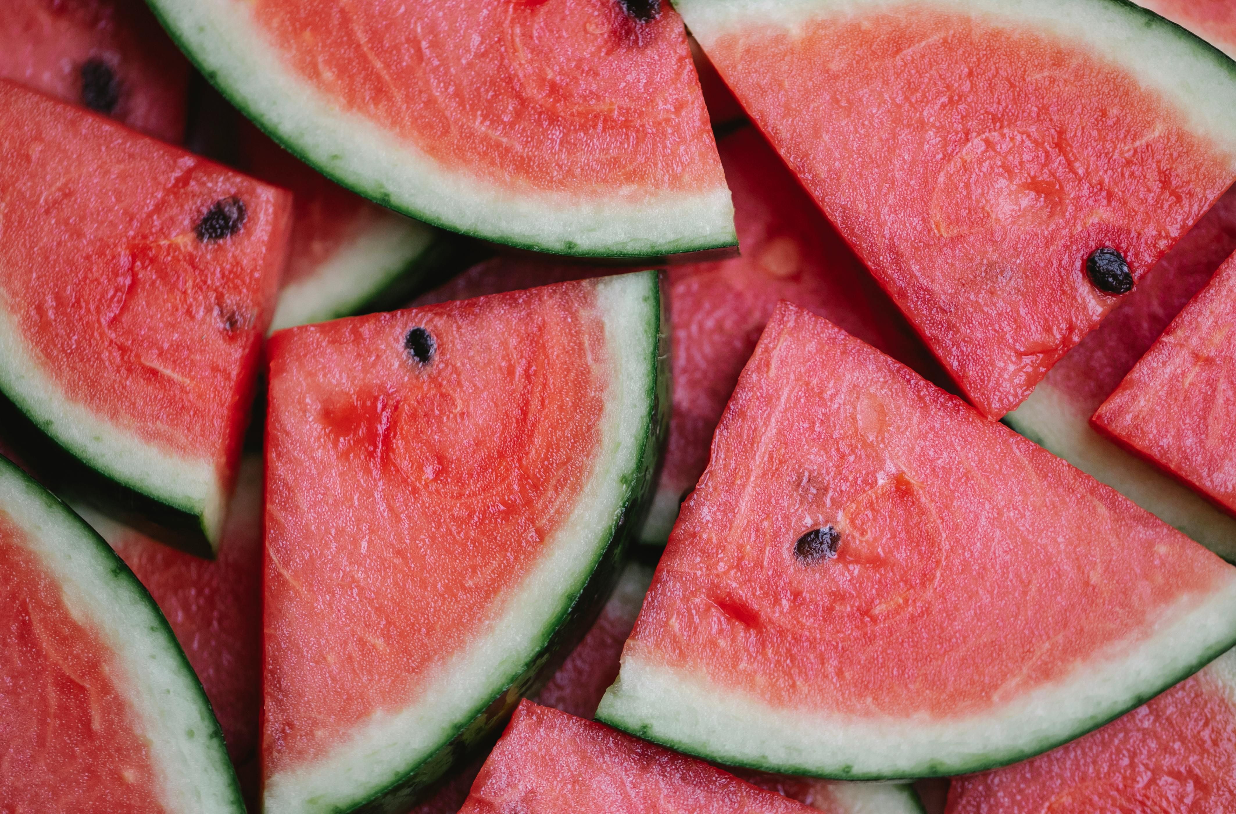 Watermelon Slices for Infused Water: A Refreshing and Hydrating Ingredient for Summer Drinks Fresh watermelon slices ready for infused water, offering hydrating and refreshing sweetness with natural antioxidants.