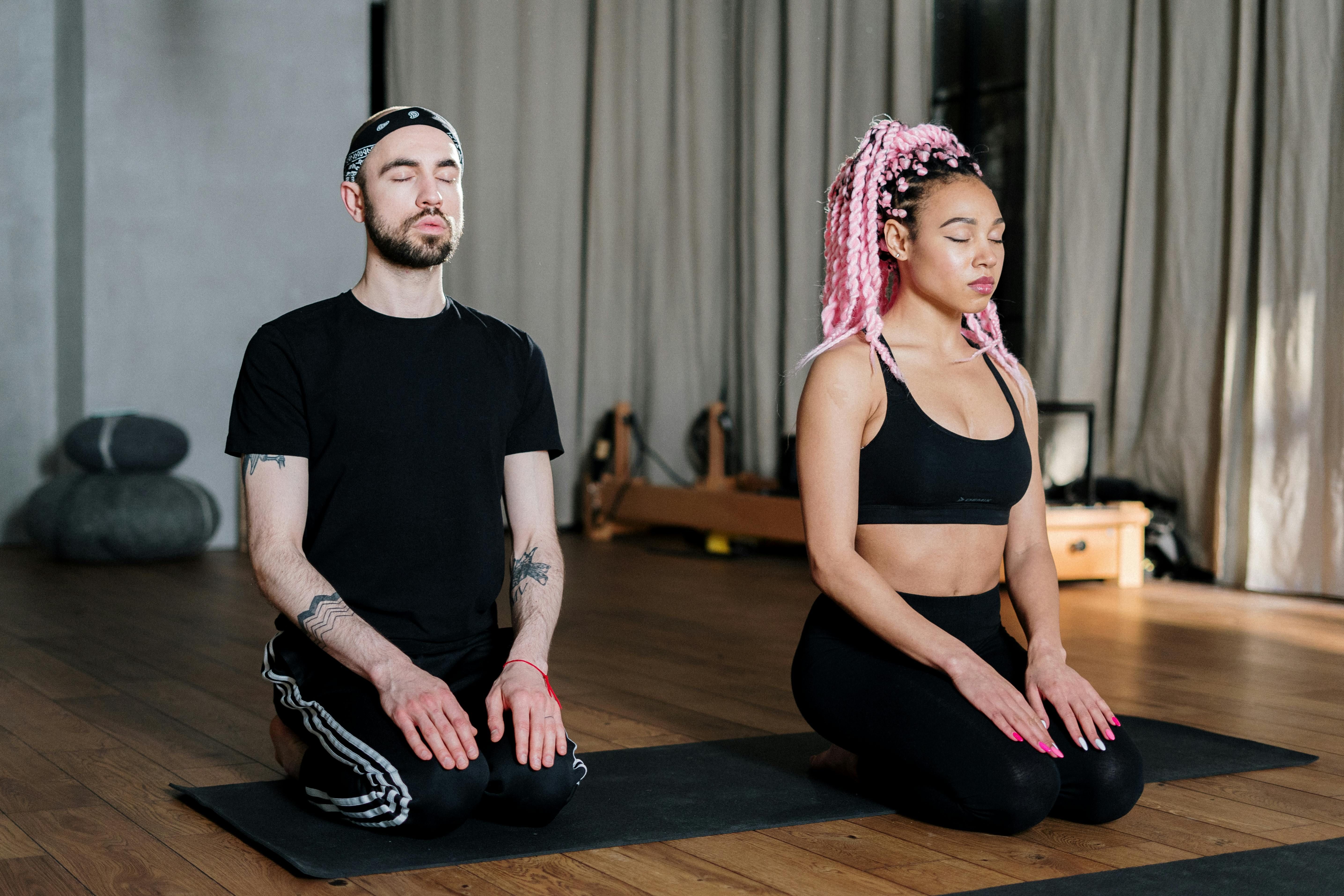 Harmony in Unity: The Serene Bond of Meditation Man and woman meditating together, finding peace and balance