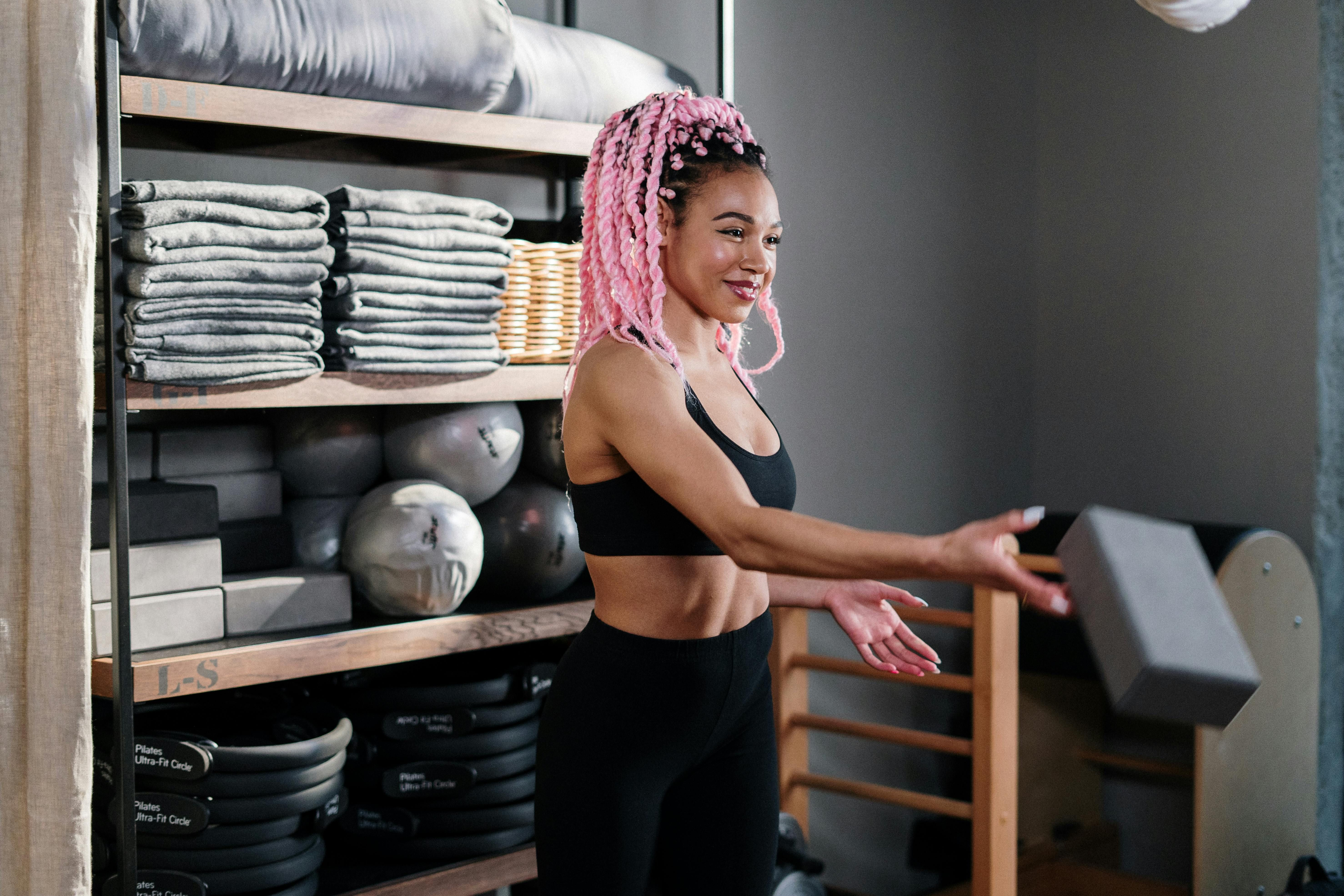 Empowerment in Action: A Woman's Joyful Workout Experience Happy woman working out, showcasing strength and joy in fitness journey